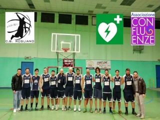 Confluenze dona un defibrillatore al Club Basket Rogliano con l'incasso di Laportaperta